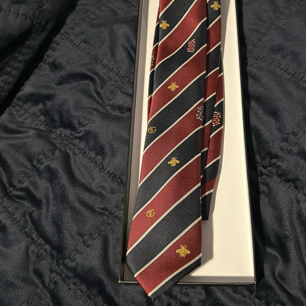 Gucci branded tie.